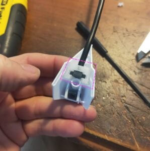 3d printed part designed to customise bandai mg qubeley by adding connection for tail - installed