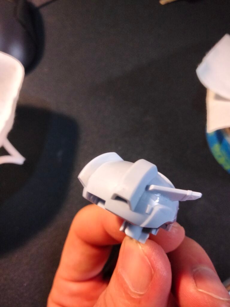 mobile-doll-clean-up-head-seam-line-cleaned